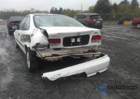 1999 Honda Civic Dx z USA, uszkodzony, nr VIN 1HGEJ6224XL007807